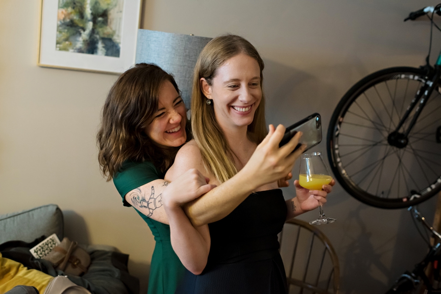 Two Bridesmaids take a selfie before the ceremony.